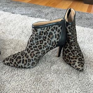 Cute Cheetah print ankle booties with 3.5 inch heel and Zipper back.